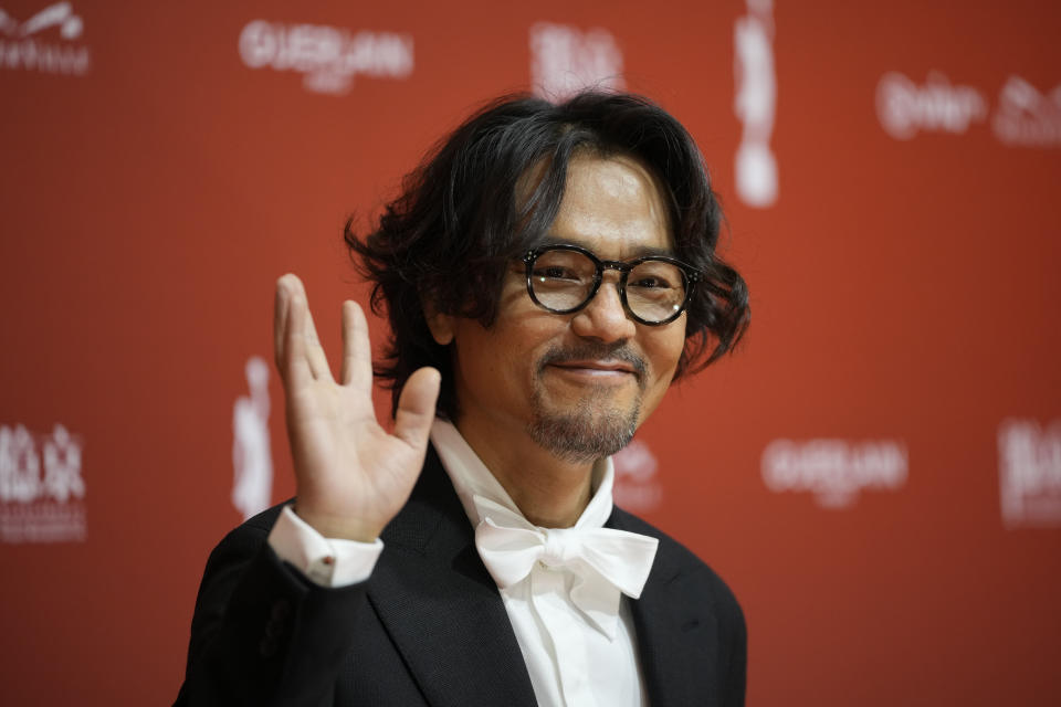 Hong Kong actor Lam Ka-Tung poses on red carpet at the Hong Kong Film Awards, Sunday, July 17, 2022. (AP Photo/Kin Cheung)