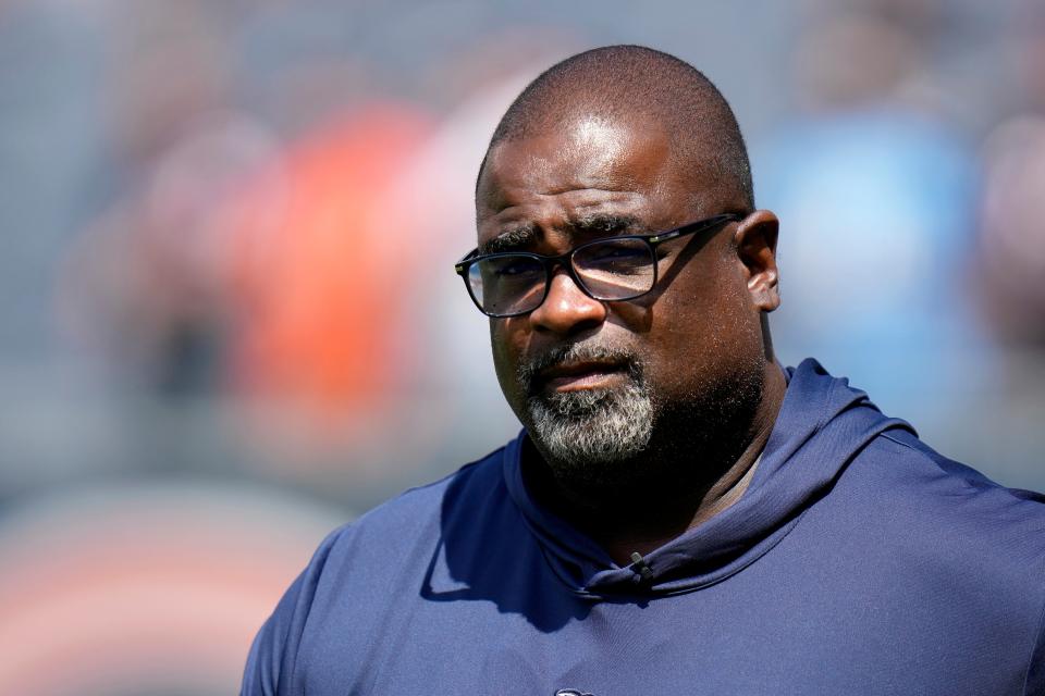 Tennessee Titans assistant head coach/defensive line coach Terrell Williams takes the field prior to an NFL preseason football game against the Chicago Bears, Saturday, Aug. 12, 2023, in Chicago. (AP Photo/Erin Hooley)