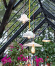<p> One way to instantly extend the use of your garden is with&#xA0;outdoor lighting, and this applies to your greenhouse, too.&#xA0; </p> <p> By wiring it up to an electrical outlet (hire a professional to ensure this is done safely), you can install all kinds of stylish designs. We adore this mix of pendants, complete with vintage-style bulbs and colorful cords for an eclectic and eye-catching style. </p> <p> Fairy lights, wall lights, and even solar-paneled lights can also be used to boost the ambiance and practicality factor. Or how about some flickering LED tealights in lanterns to really set a relaxing mood? </p>