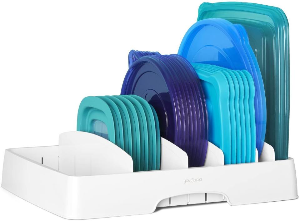 Your Tupperware drawer that's gotten out of control? Get it organized with this <a href="https://amzn.to/2GpxfeS" target="_blank" rel="noopener noreferrer">lid storage tray</a>. Find it for $20 on <a href="https://amzn.to/2GpxfeS" target="_blank" rel="noopener noreferrer">Amazon</a>.