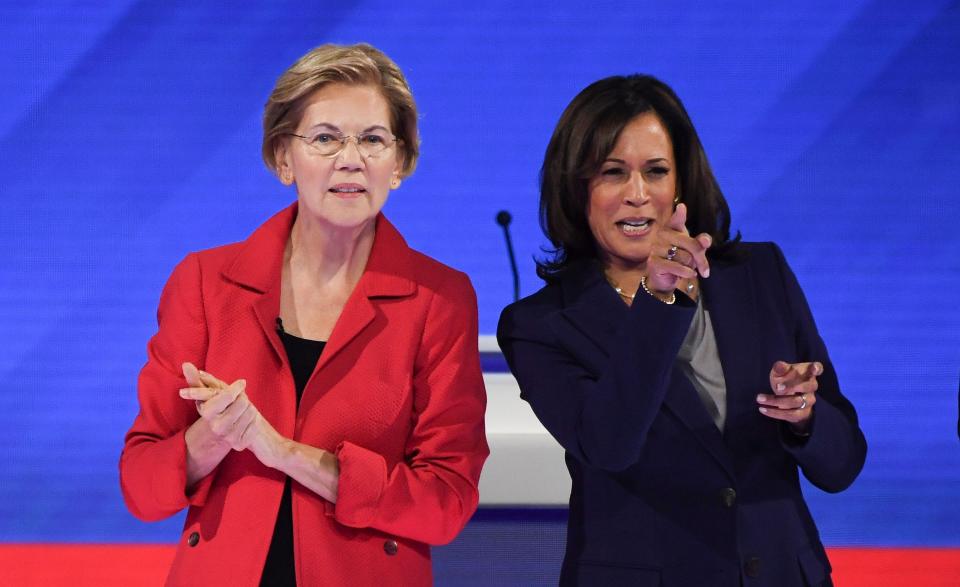 Sens. Elizabeth Warren and Kamala Harris take part in a Democratic primary debate in Houston on Sept. 12, 2019.