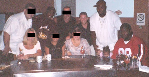 Nevin Shapiro and a second source say this photo was taken at Japanese steakhouse Benihana in 2003. The dinner, which was paid for by Shapiro, was attended by players Jonathan Vilma (standing on left), Santonio Thomas (standing on right) and Vince Wilfork (seated in red on right).