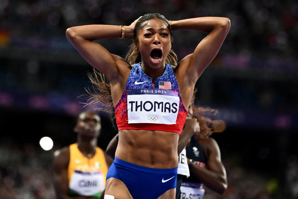 US' Gabrielle Thomas celebrates winning the women's 200m final of the athletics event at the Paris 2024 Olympic Games at Stade de France in Saint-Denis, north of Paris, on August 6, 2024. (Photo by Jewel SAMAD / AFP) (Photo by JEWEL SAMAD/AFP via Getty Images)