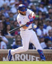 Chicago Cubs' Patrick Wisdom hits an RBI single off Milwaukee Brewers relief pitcher Bryan Hudson during the eighth inning of a baseball game Saturday, May 4, 2024, in Chicago. (AP Photo/Charles Rex Arbogast)
