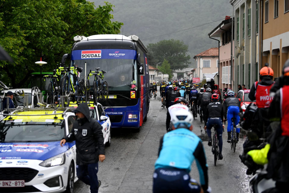 CRANSMONTANA SWITZERLAND  MAY 19 Team Soudal  Quick Step bus and cars on their way to the new start localisation during the 106th Giro dItalia 2023 Stage 13 a 75km stage from Le Chable to CransMontana  Valais 1456m  Stage shortened due to the adverse weather conditions  UCIWT  on May 19 2023 in CransMontana Switzerland Photo by Tim de WaeleGetty Images