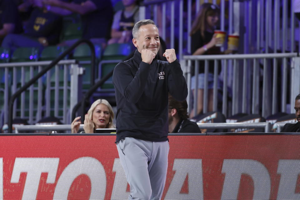 In a photo provided by Bahamas Visual Services, Texas Tech head coach Grant McCasland reacts during an NCAA college basketball game against Michigan in the Battle 4 Atlantis at Paradise Island, Bahamas, Friday, Nov. 24, 2023. (Tim Aylen/Bahamas Visual Services via AP)