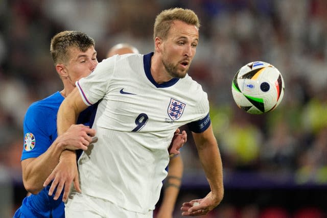 England’s Harry Kane challenges for the ball with Slovenia’s Jaka Bijol during the Euro 2024 game