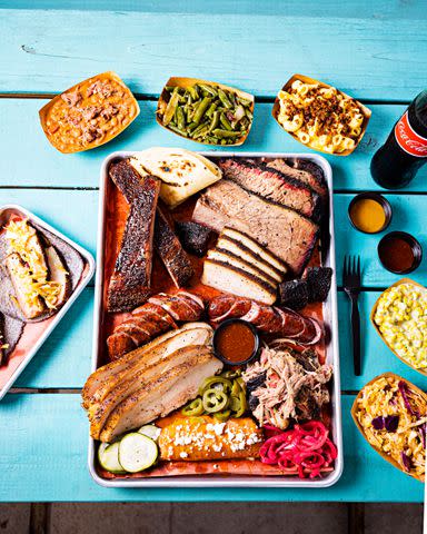 <p>Robbie Caponetto</p> Pork ribs, sausage, and tamales are standouts at LaVaca BBQ.