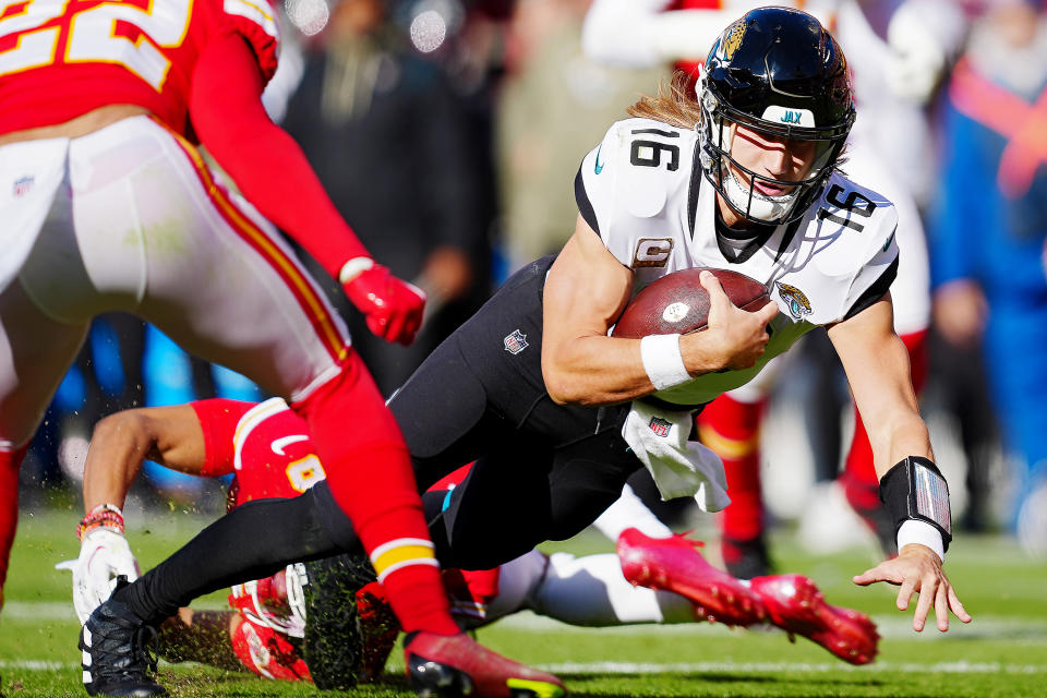 KANSAS CITY, MISSOURI - NOVEMBER 13: Trevor Lawrence #16 of the Jacksonville Jaguars falls to the ground after a tackle in the second quarter of the game against the Kansas City Chiefs at Arrowhead Stadium on November 13, 2022 in Kansas City, Missouri. (Photo by Jason Hanna/Getty Images)