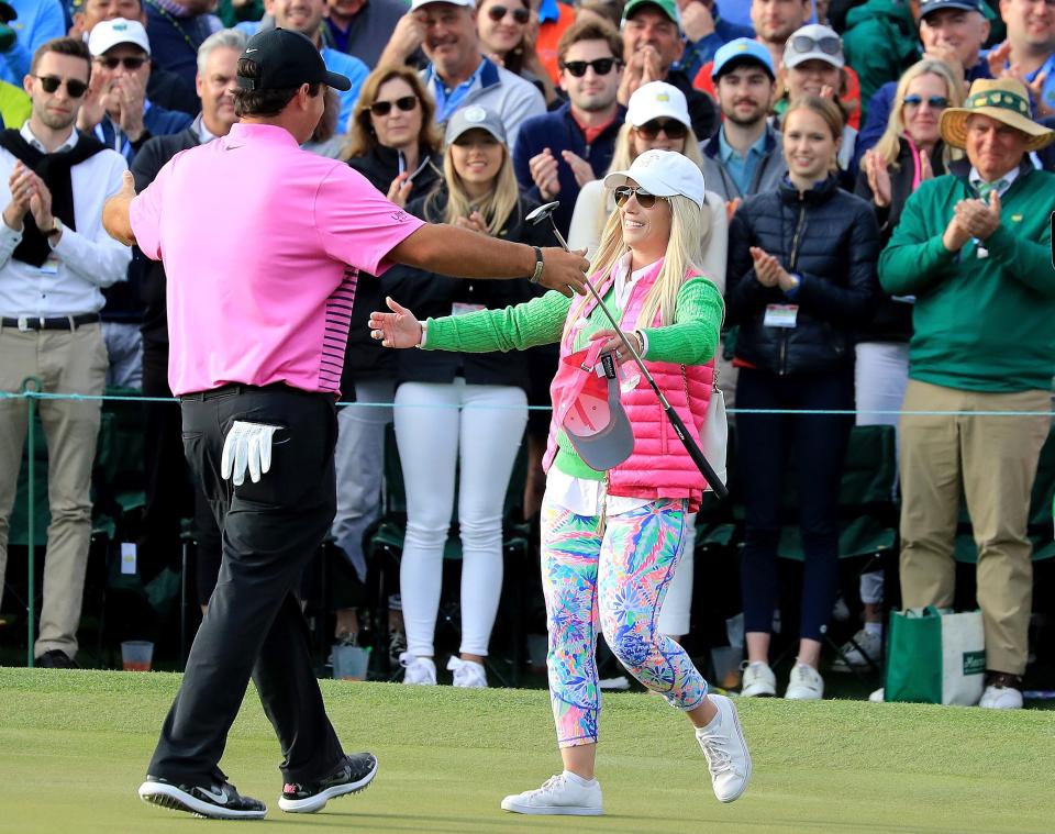 AUGUSTA, GA - APRIL 08:  Patrick Reed of the United States celebrates with his wife Justine after making par on the18th green during the final round to win the 2018 Masters Tournament at Augusta National Golf Club on April 8, 2018 in Augusta, Georgia.  (Photo by David Cannon/Getty Images)