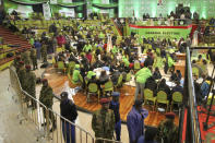 Police are deployed to provide security after scuffles broke out between political party agents and police at the electoral commission's national tallying center in Nairobi, Kenya late night Saturday, Aug. 13, 2022. Kenya's peaceful presidential election saw a brief disruption late Saturday when police responded to scuffles at the national tallying center amid tensions over the close results. (AP Photo)