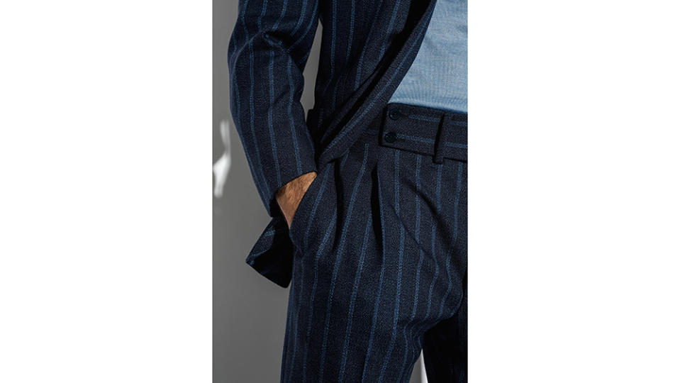 These trousers’ double-button waist tab and kissing pleats are among the sartorial details that ground Isaia’s more irreverent designs in the Neapolitan tailoring tradition. - Credit: Courtesy of Isaia