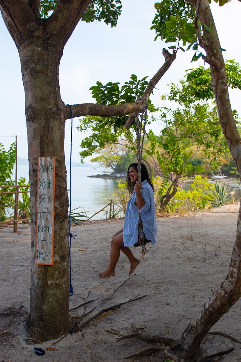 Patel often leaves her partner at home while she jets off around the world, pictured in the Philippines. (Christina Patel/SWNS)