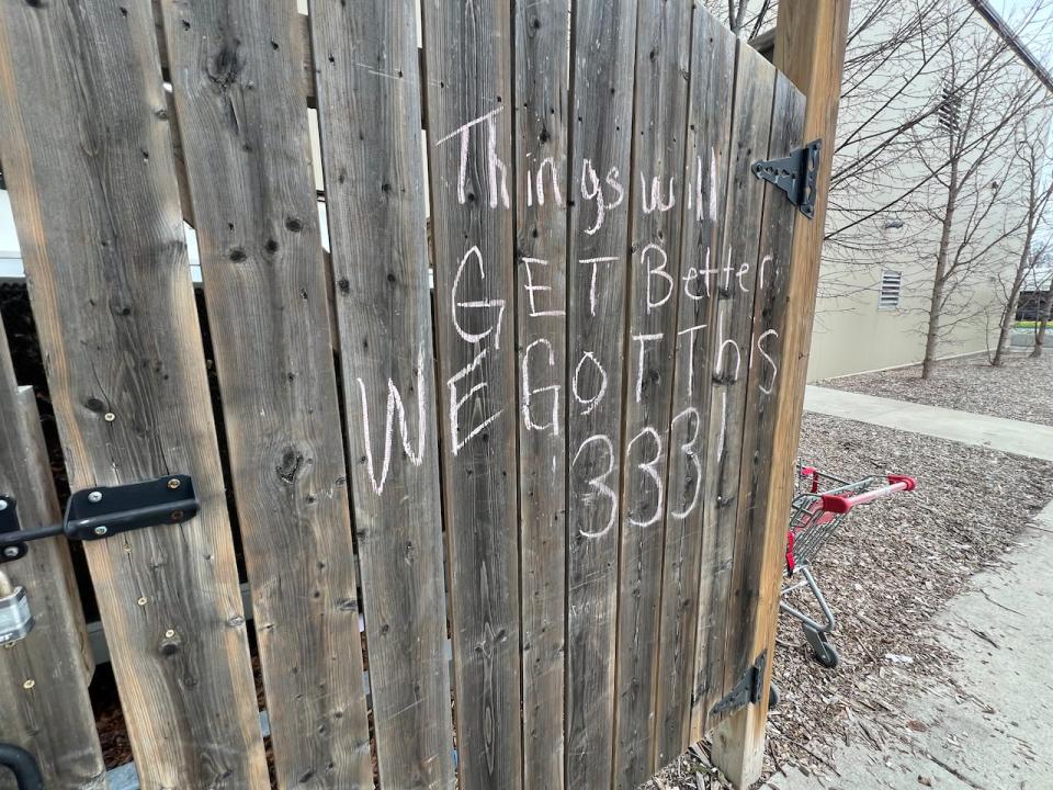 A message of hope for residents of 333 Glengarry ave scrawled in Chalk onto a door near an entrance to the temporary shelter at the WFCU centre.