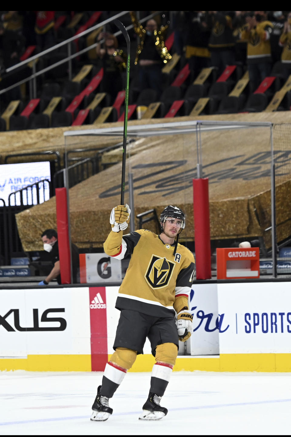 Vegas Golden Knights right wing Reilly Smith skates on the ice after being name the first star of an NHL hockey game, in which he scored three goals against the St. Louis Blues on Saturday, May 8, 2021, in Las Vegas. (AP Photo/David Becker)