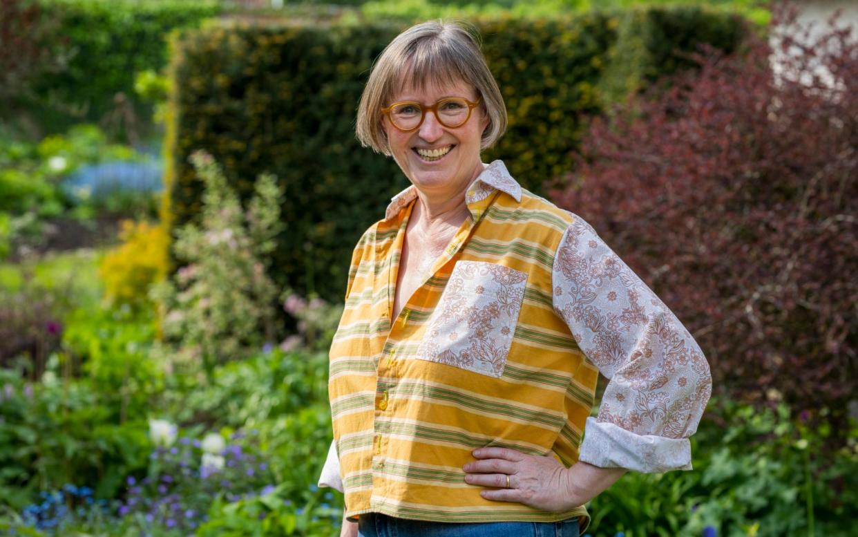 Bella Hoare in the garden of Gasper Cottage on the Stourhead Estate