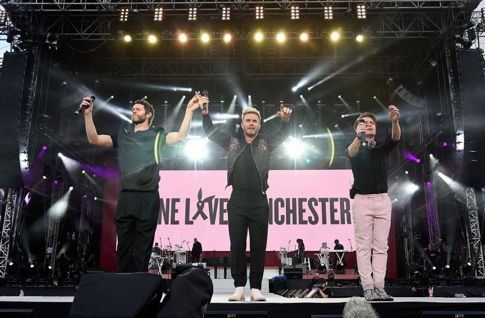 Howard Donald, Gary Barlow and Mark Owen of Take That perform on stage during the One Love Manchester Benefit Concert at Old Trafford on June 4, 2017 in Manchester, England.&nbsp;