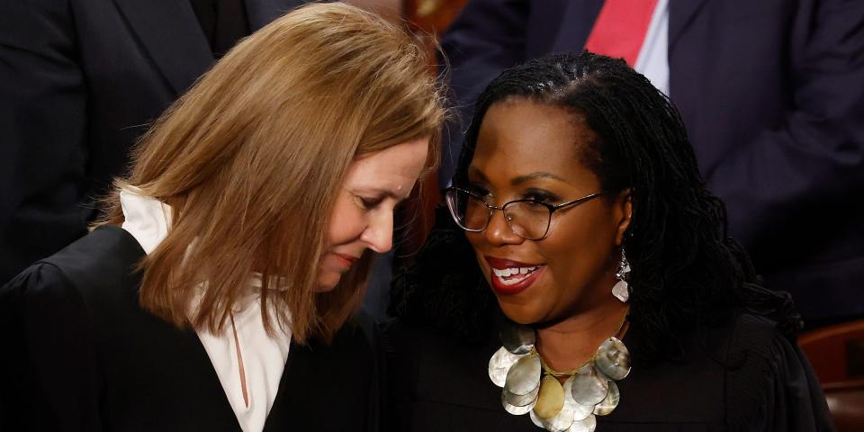 US Supreme Court Associate Justices Amy Coney Barrett, left, and Ketanji Brown Jackson.