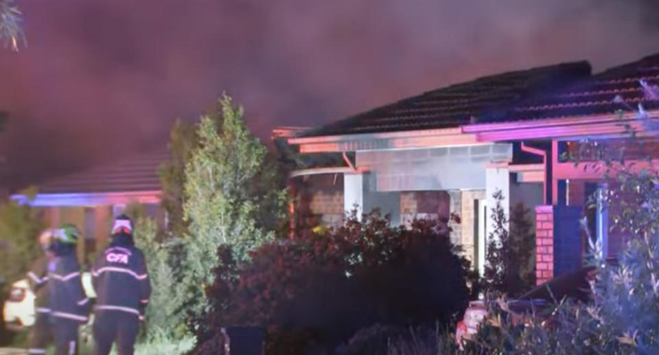 Firefighters attend a house fire in Werribee, Victoria.