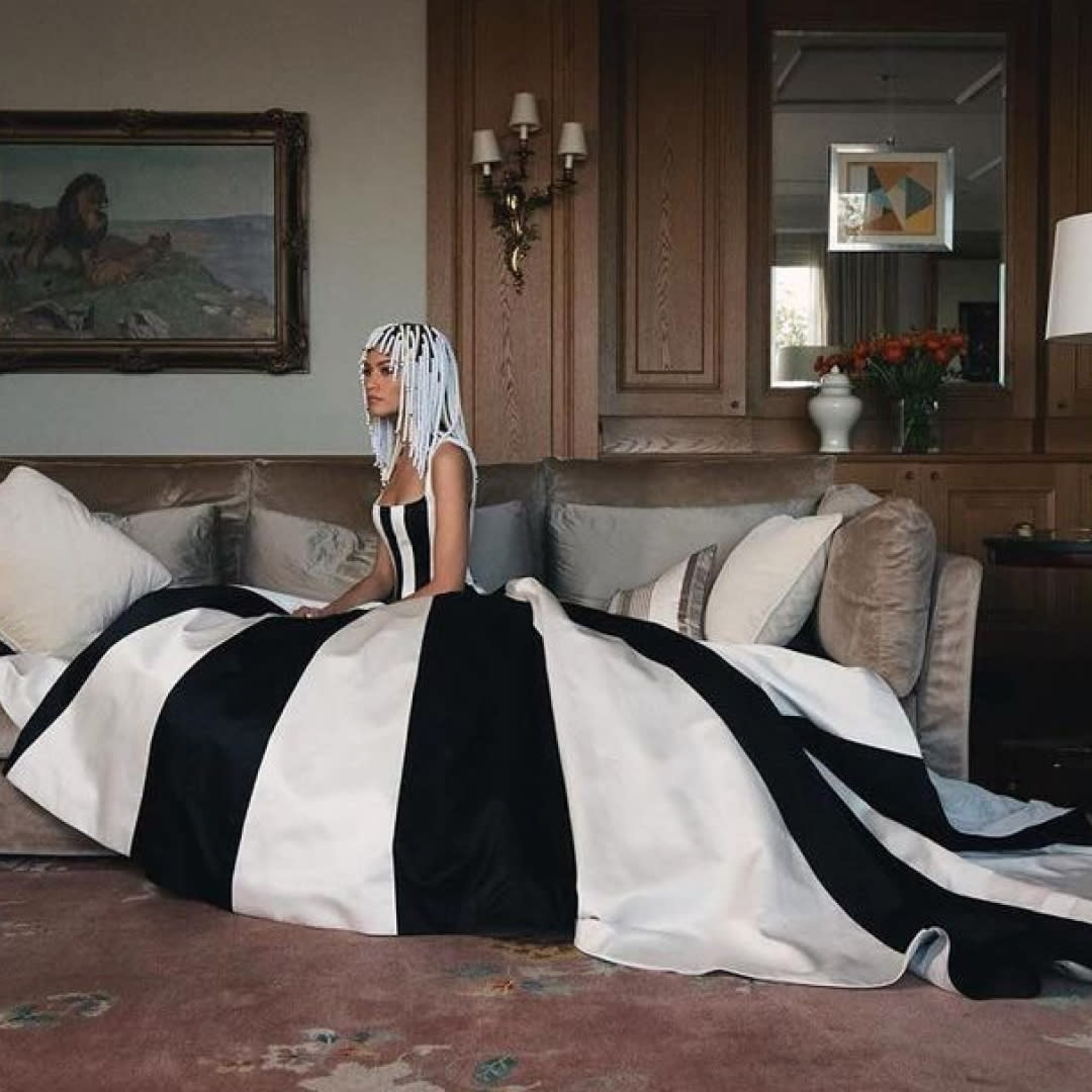  Zendaya sits on a couch wearing a black and white Carolina Herrera gown to reference Venus and Serena Williams in Vogue. 