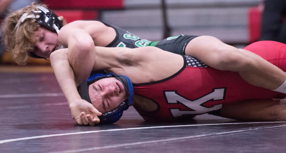 Camden Catholic's Dom DiGiacomo, top, controls Kingsway's Jason Meola during the 106 lb. bout of the wrestling meet held at Kingsway Regional High School in Woolwich Township on Saturday, January 8, 2022.  DiGiacomo defeated Meola, 6-4.