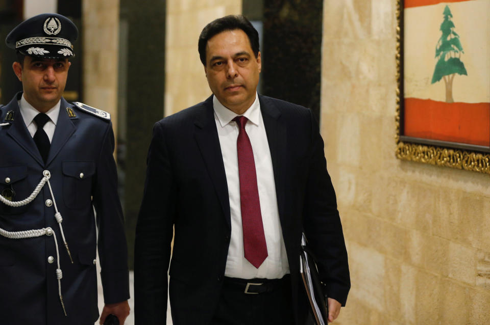 Lebanon's Prime Minister Hassan Diab arrives at the presidential palace in Baabda