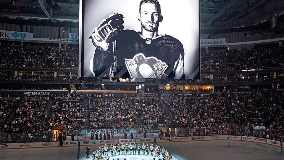 The Penguins and Ducks gathered at centre ice before Monday night's NHL game in a tribute to former Pittsburgh player Adam Johnson, who died after being cut by a skate blade during a game in the U.K. on Saturday. Police have moved to a wider investigation that could take a while to complete.