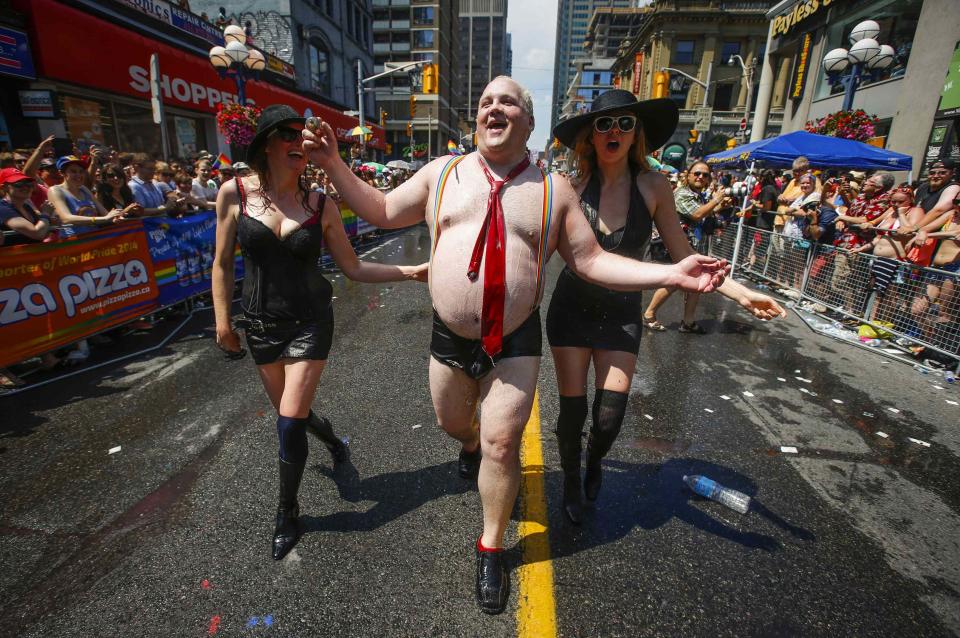 A man dressed to mock Toronto Mayor Rob Ford takes part in the" WorldPride" gay pride Parade in Toronto