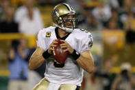 GREEN BAY, WI - SEPTEMBER 08: Drew Brees #9 of the New Orleans Saints looks to pass against the Green Bay Packers during the season opening game at Lambeau Field on September 8, 2011 in Green Bay, Wisconsin. (Photo by Jonathan Daniel/Getty Images)