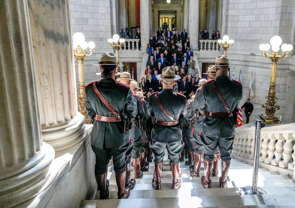 State troopers in formation witness the swearing-in of Col. Darnell S. Weaver as state police superintendent in 2022.