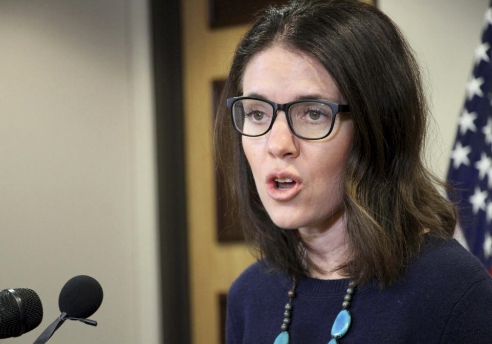 Dr. Anne Zink, the chief medical officer for the state of Alaska, addresses reporters at a news conference Monday, March 9, 2020, in Anchorage, Alaska. State officials said 23 people have been tested for the new coronavirus with no positive results. (AP Photo/Mark Thiessen)