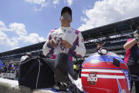 Alex Palou, of Spain, looks at his qualification results for the Indianapolis 500 auto race at Indianapolis Motor Speedway, Sunday, Aug. 16, 2020, in Indianapolis. (AP Photo/Darron Cummings)