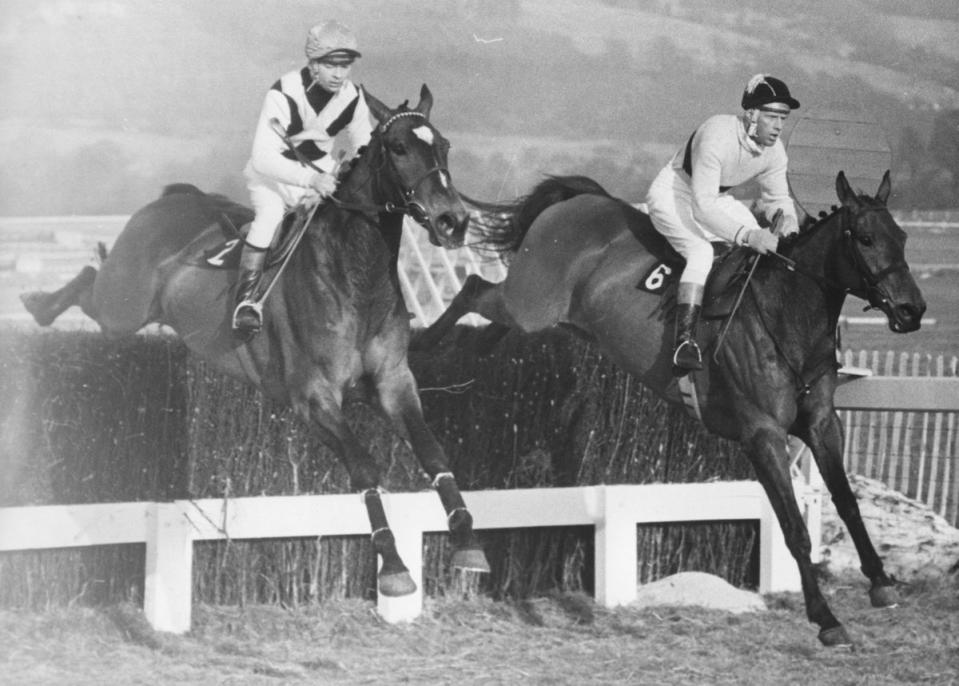 1965: Pat Taaffe on Arkle (right) jumps a fence ahead of G.W.Robinson on Mill House to win The Cheltenham Gold Cup (Allsport Hulton/Archive/Getty Images)