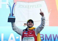 Motor Racing - Formula E - Berlin E-Prix - Flughafen Tempelhof, Berlin, Germany - May 19, 2018 Audi Sport Abt Schaeffler's Daniel Abt celebrates with the trophy after winning the race REUTERS/Fabian Bimmer