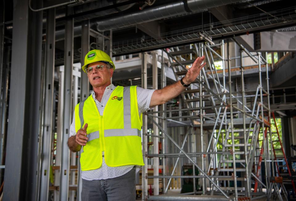 John Fernandez, senior vice president of innovation & strategic partnerships at The Mill discusses The Forge, a new tech center, across from The Mill on North Madison Street on Tuesday, June 26, 2024.