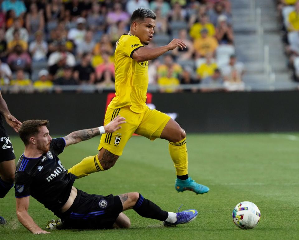 Aug 3, 2022; Columbus, Ohio, USA; Columbus Crew forward Cucho Hernandez (9) dribbles the ball past CF Montreal defender Joel Waterman (16) in the first half during their MLS game between the Columbus Crew and CF Montreal at Lower.com Field in Columbus, Ohio on August 3, 2022. 