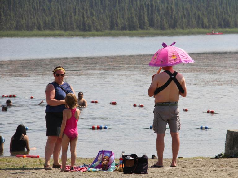 An "all-time high" temperature record has been set in the US state of Alaska, despite much of the country sitting in the Arctic circle.Temperatures peaked at 32.22 Celsius (90F) on 4 July at an airport in Anchorage, the state's largest city.National Weather Service meteorologist Bob Clay said Anchorage's average high temperature for US Independence Day is 23.89C (75F).Other local records were set across southern Alaska and come after five weeks of above average temperatures.Shawn King, who has lived his entire life in Anchorage, said he had never seen a stretch of similar hot weather. > The 4thofjuly2019 was one for the books. Several ALL-TIME high temperature records were set at official observation sites throughout Southern Alaska. But that's not all...there were more daily temperature records set too! AKwx ItsHotInAlaska pic.twitter.com/GxcdUaD9ld> > — NWS Anchorage (@NWSAnchorage) > > July 5, 2019The 31-year-old used the occasion to take his daughter, Tessa, fishing for the first time on the dock of Jewel Lake.She insisted on going barefoot."It's too hot for shoes," the four-year-old said.While tourists have been caught out after being told to expect cooler temperatures. Judy Zickmund, who arrived in Anchorage on a cruise, said: "We didn't pack clothes for it".Three other Alaska locations, Kenai, Palmer and King Salmon, set or tied all-time high temperature records. However the statewide record of 37.8C (100F), was set at Fort Yukon in the state's north east region over a century ago.Meteorologists say a "heat dome" over the state is responsible for the latest heatwave, and is set to continue for days as the system moves north.Rick Thoman, a climate specialist at the University of Alaska said these exceptionally warm weather events will only become more frequent because of the loss of sea ice and warming in the Arctic Ocean."These kinds of extreme weather events become much more likely in a warming world," Thoman said. "Surface temperatures are above normal everywhere around Alaska. The entire Gulf of Alaska, in the Bering Sea, in the Chukchi Sea south of the ice edge, exceptionally warm waters, warmest on record, and of course record-low sea ice extent for this time of year off the north and northwest coasts of the state."