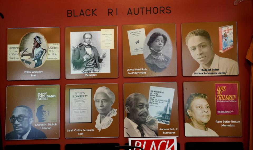 A display of Black Rhode Island authors on the wall at Stages of Freedom.