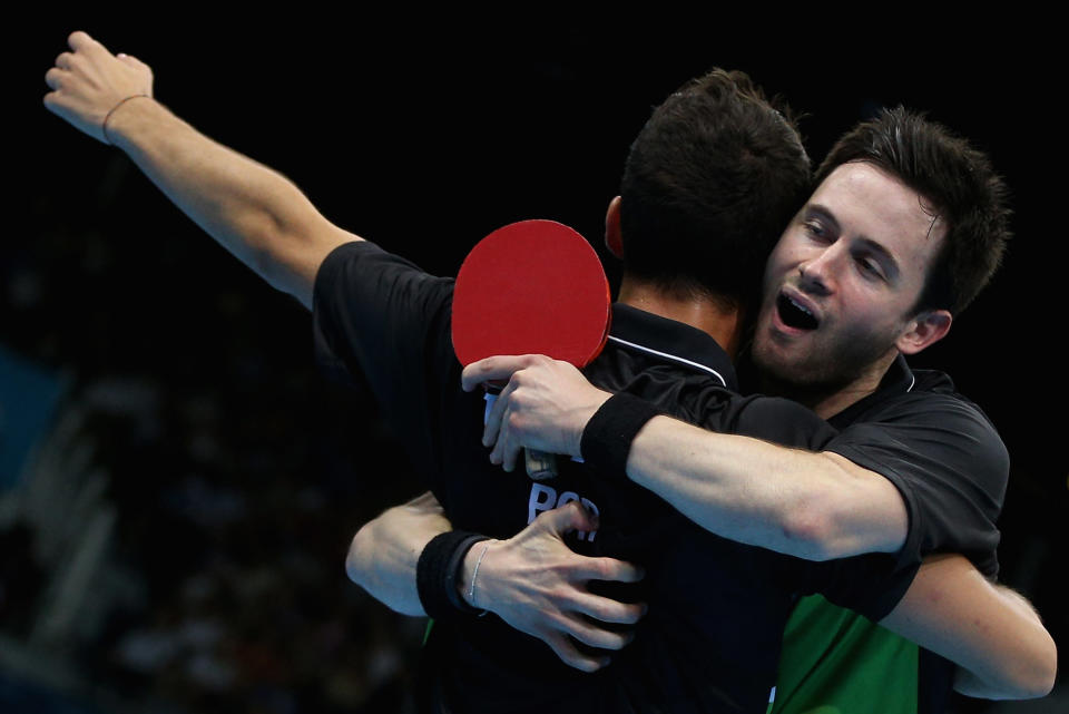 LONDON, ENGLAND - AUGUST 03: Joao Monteiro and Tiago Apolonia of Portugal celebrate during Men's Team Table Tennis first round match against team of Great Britain on Day 7 of the London 2012 Olympic Games at ExCeL on August 3, 2012 in London, England. (Photo by Feng Li/Getty Images)