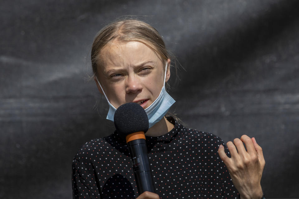 BERLIN, GERMANY - AUGUST 20: Swedish climate activist Greta Thunberg speaks at a press conference following the meeting with German Chancellor Angela Merkel on August 20, 2020 in Berlin, Germany. Two years on from her first school strike, 17-year-old climate activist Greta Thunberg is meeting German Chancellor Angela Merkel to deliver a petition letter calling for EU leaders to end investments in the exploration and extraction of fossil fuels.  (Photo by Maja Hitij/Getty Images)