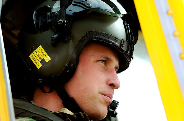 Prince William at the controls of a Sea King helicopter. (Photo by John Stillwell/Getty)