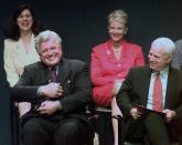 <p>Sen. Edward Kennedy jokingly holds the Profile in Courage award lantern as if he intends to keep it, as co-winner, Senator John McCain looks on during ceremonies at the John F. Kennedy Library in Boston, Mass., on May 24, 1999. In back row are their spouses, Victoria Kennedy, left, and Cindy McCain. (Photo: Elise Amendola/AP) </p>