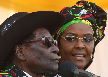 President Robert Mugabe and his wife Grace attend a rally of his ruling ZANU (PF) in Chinhoyi, Zimbabwe, July 29, 2017. REUTERS/Philimon Bulawayo