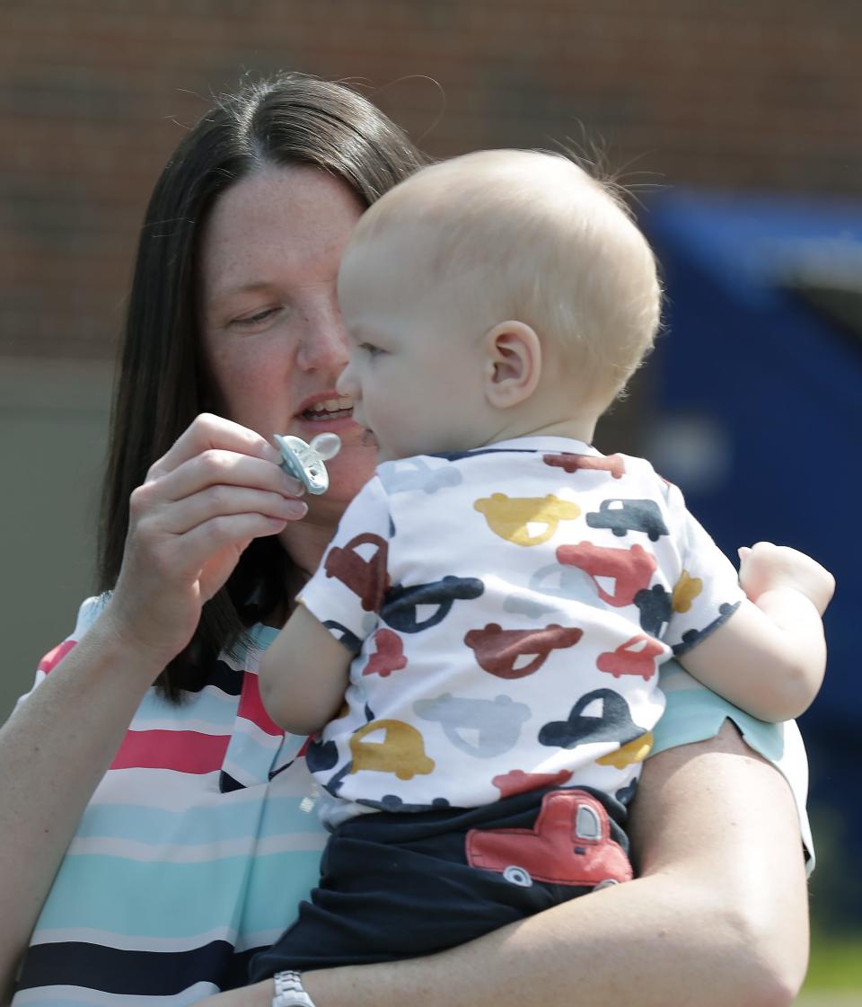 Since Lewis was born nine months ago, Liz Szilagyi, a student at the University of Wisconsin-Oshkosh, has not had reliable child care for him. The past few semesters, she has cobbled together care from friends and family, and her husband also had to take time off work.