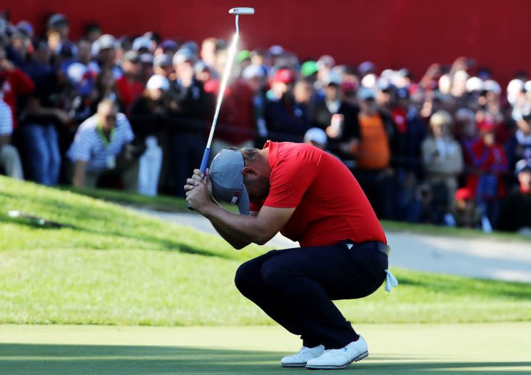 Ryan Moore reacts after missing a putt on the eighth green. (AP)