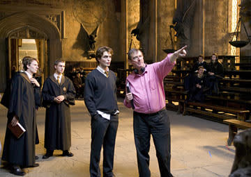 <p>Director Mike Newell with Robert Pattinson on the set of Warner Bros. Pictures' Harry Potter and the Goblet of Fire - 2005</p>