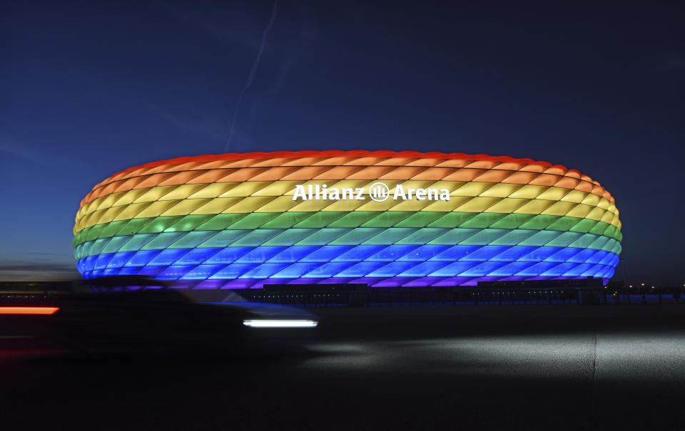Munich’s stadium is illuminated in rainbow colors on the occasion of Christopher Street Day in Munich, Germany, Saturday, July 9, 2016. UEFA has declined the Munich city council’s application to have its stadium illuminated in rainbow colors for Germany’s final Euro 2020 group game against Hungary on Wednesday June 23, 2021. (Tobias Hase/dpa via AP)
