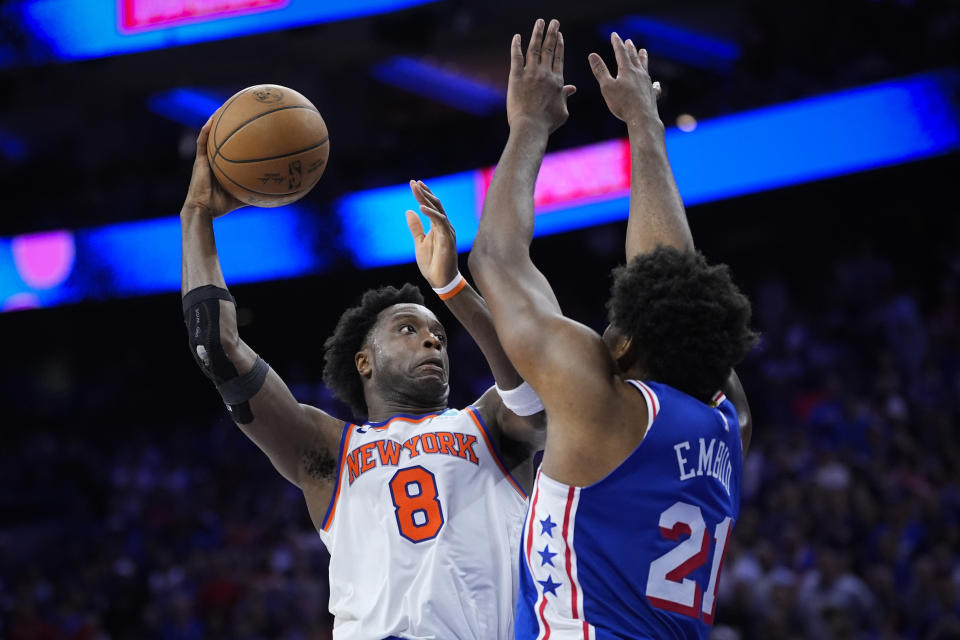 New York Knicks' OG Anunoby (8) goes up to shoot against Philadelphia 76ers' Joel Embiid (21) during the first half of Game 6 in an NBA basketball first-round playoff series, Thursday, May 2, 2024, in Philadelphia. (AP Photo/Matt Slocum)