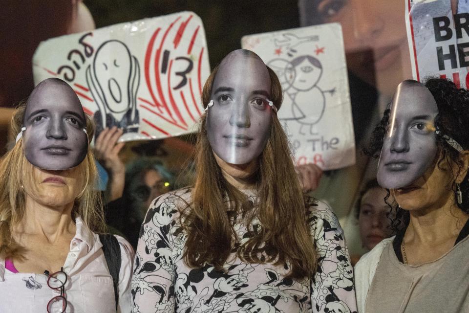 Women protest against Israeli Prime Minister Benjamin Netanyahu's government and call for the release of hostages held in the Gaza Strip by the Hamas militant group, in Tel Aviv, Israel, April 11, 2024. (AP Photo/Ariel Schalit)