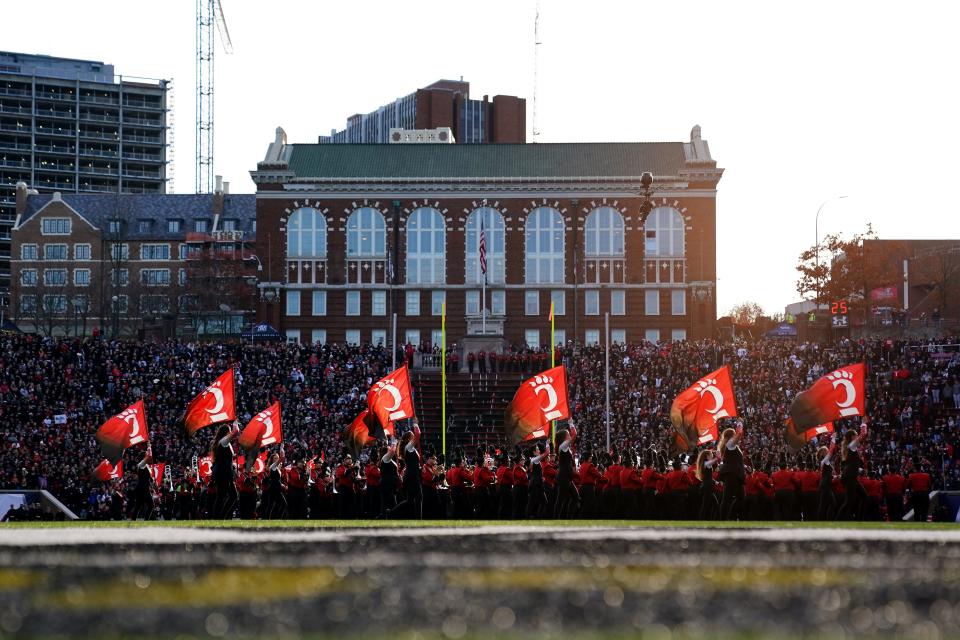 The University of Cincinnati marching band performs ahead of kickoff of the first quarter during the American Athletic Conference championship football game between the Houston Cougars and the Cincinnati Bearcats, Saturday, Dec. 4, 2021, at Nippert Stadium in Cincinnati. 